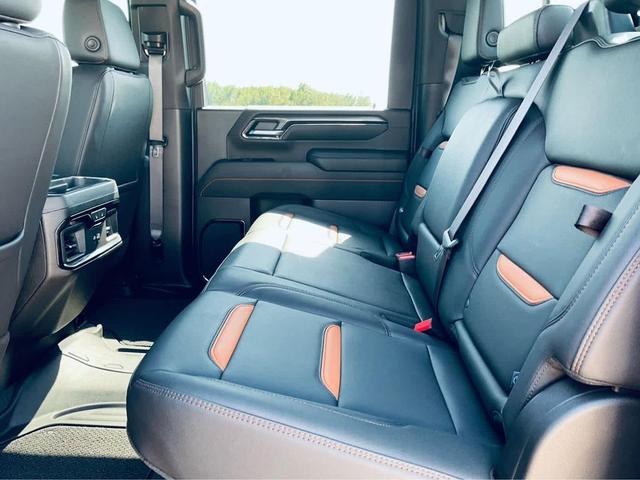 Photo of 2024 Volcanic Red Tintcoat GMC Sierra 2500