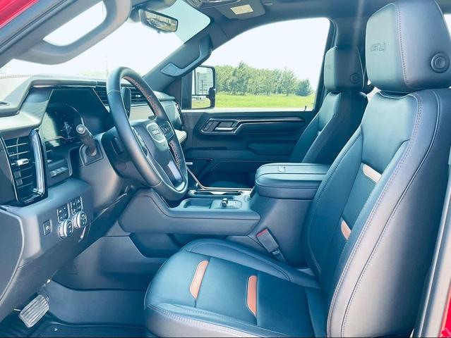 Photo of 2024 Volcanic Red Tintcoat GMC Sierra 2500