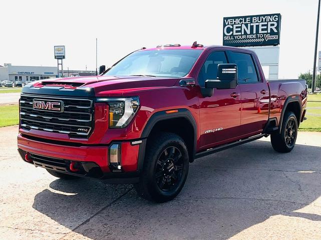 Photo of 2024 Volcanic Red Tintcoat GMC Sierra 2500