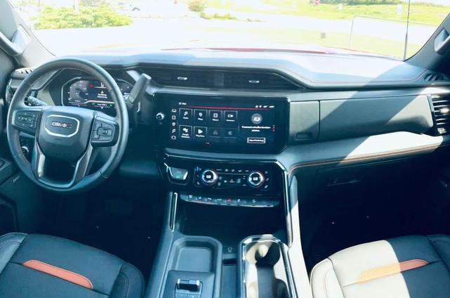 Photo of 2024 Volcanic Red Tintcoat GMC Sierra 2500