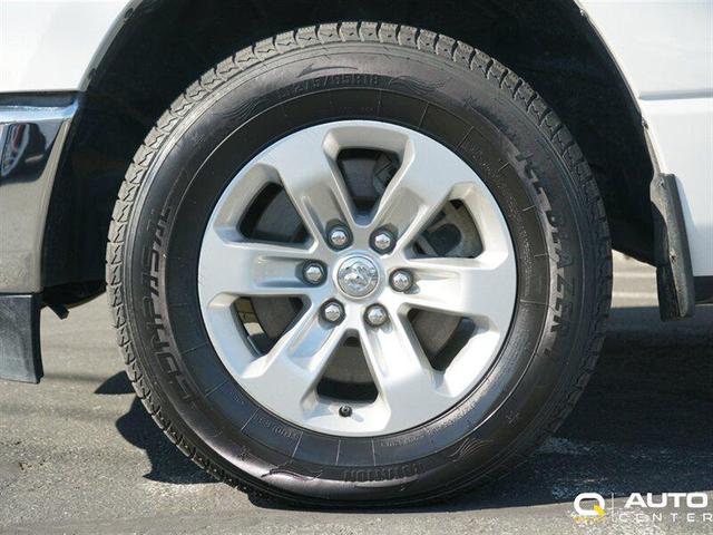 Photo of 2023 Ivory Tri-Coat Pearl RAM 1500