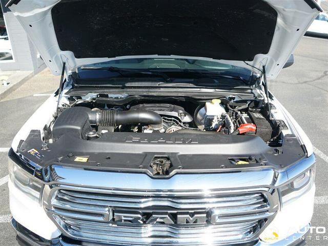 Photo of 2023 Ivory Tri-Coat Pearl RAM 1500