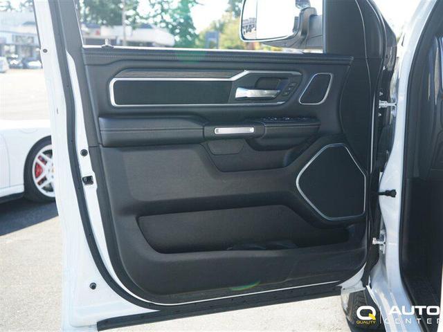 Photo of 2023 Ivory Tri-Coat Pearl RAM 1500