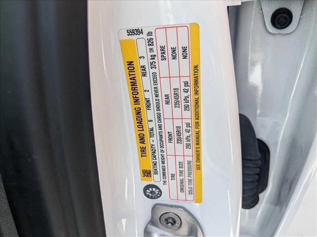 Photo of 2023 Pearl White Multi-Coat Tesla Model 3