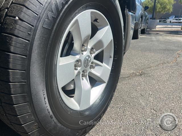 Photo of 2024 Diamond Black Crystal Pearlcoat RAM 1500 Classic