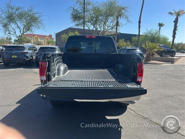 Photo of 2024 Diamond Black Crystal Pearlcoat RAM 1500 Classic