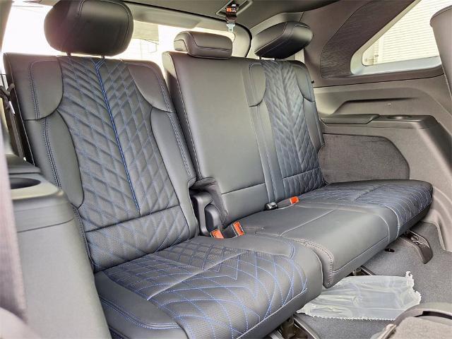 Photo of 2025 Black Cherry Cadillac Escalade IQ