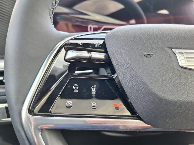 Photo of 2025 Black Cherry Cadillac Escalade IQ