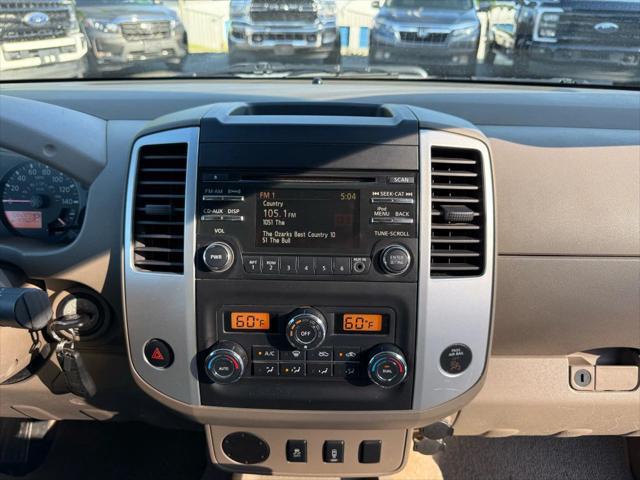 Photo of 2013 Glacier White Nissan Frontier