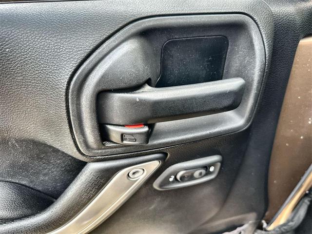 Photo of 2015 Copper Brown Pearlcoat Jeep Wrangler Unlimited