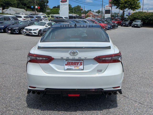 Photo of 2023 Wind Chill Pearl/Midnight Black Metallic Toyota Camry