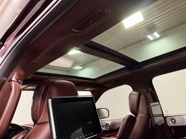 Photo of 2021 Burgundy Velvet Lincoln Navigator