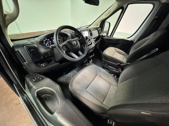 Photo of 2023 Bright White Clearcoat RAM ProMaster 2500