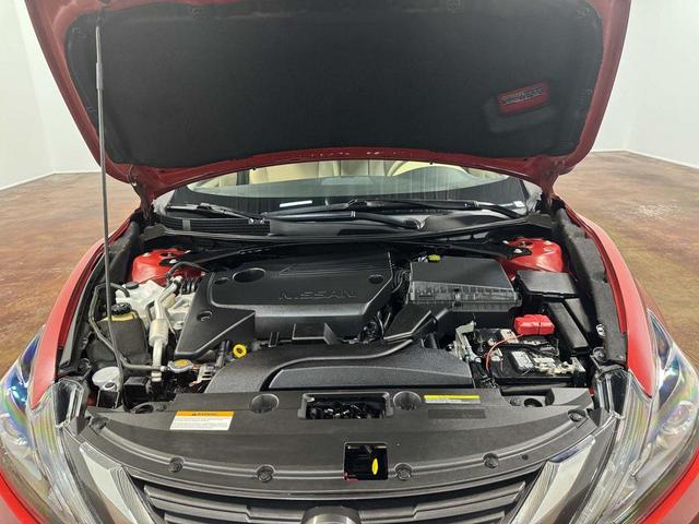 Photo of 2017 Cayenne Red Nissan Altima