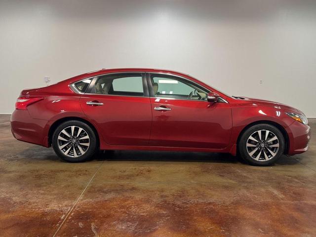 Photo of 2017 Cayenne Red Nissan Altima
