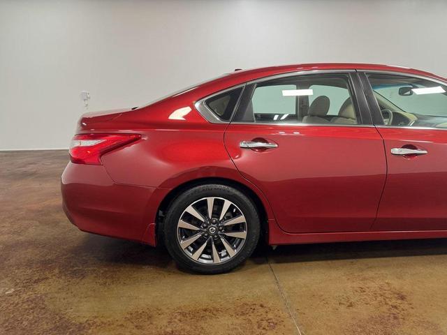 Photo of 2017 Cayenne Red Nissan Altima
