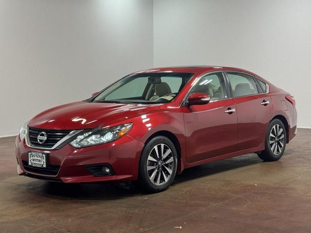 Photo of 2017 Cayenne Red Nissan Altima