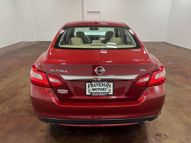 Photo of 2017 Cayenne Red Nissan Altima