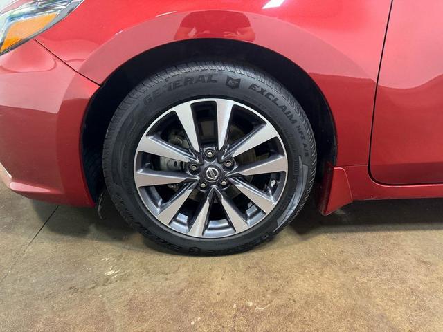 Photo of 2017 Cayenne Red Nissan Altima