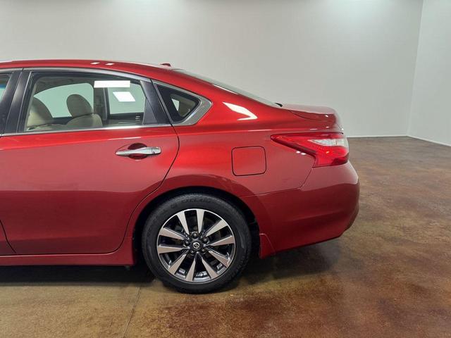 Photo of 2017 Cayenne Red Nissan Altima