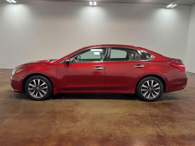 Photo of 2017 Cayenne Red Nissan Altima