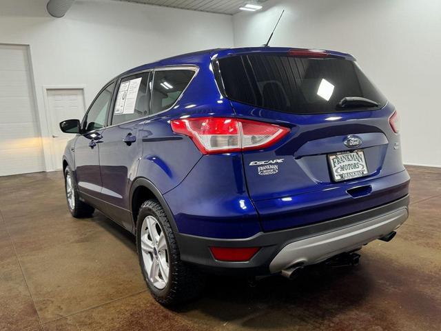 Photo of 2016 Deep Impact Blue Ford Escape