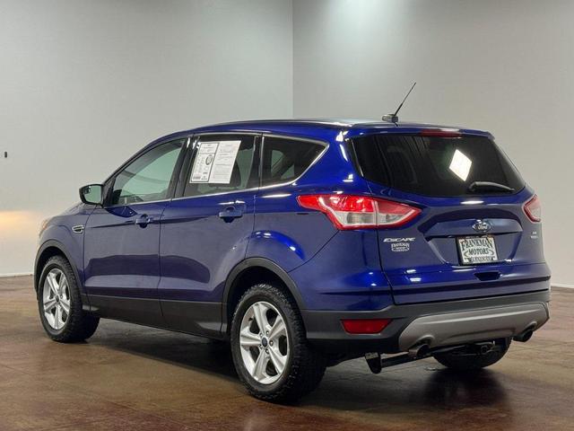 Photo of 2016 Deep Impact Blue Ford Escape
