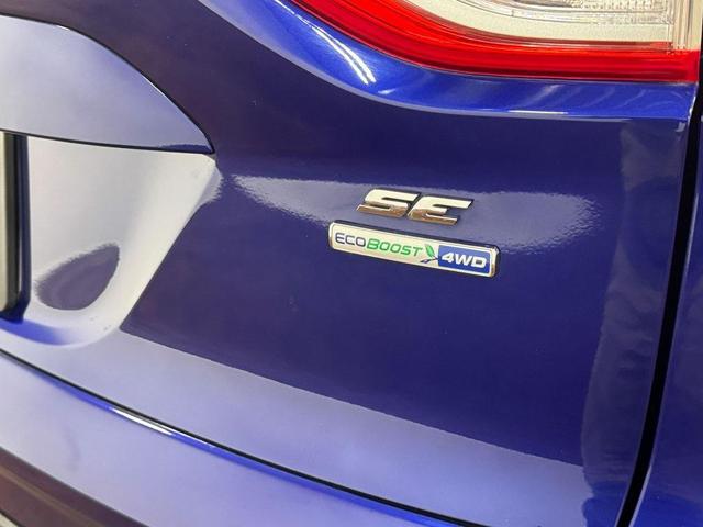 Photo of 2016 Deep Impact Blue Ford Escape