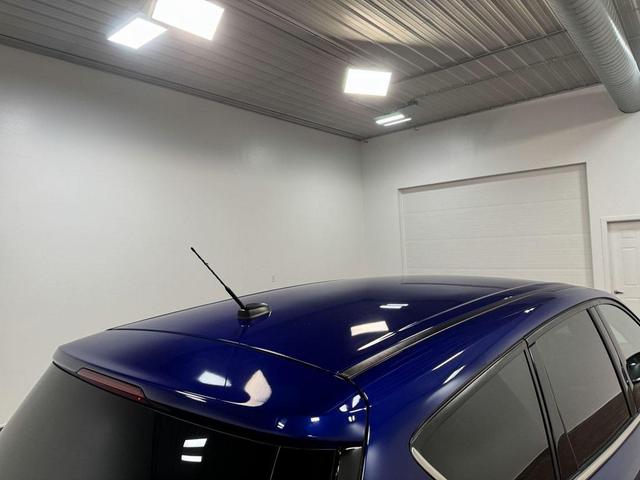 Photo of 2016 Deep Impact Blue Ford Escape