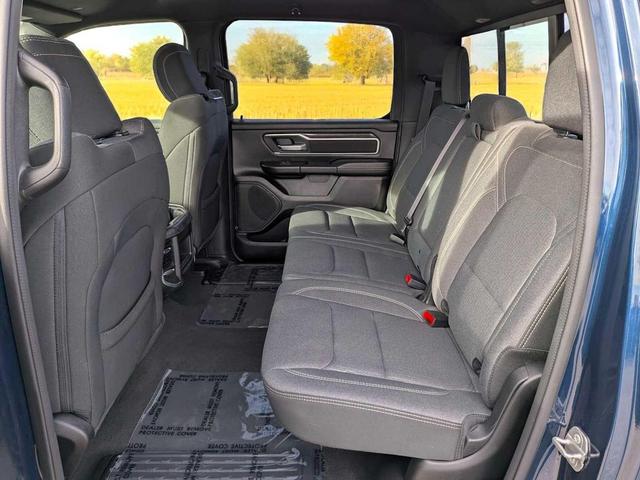 Photo of 2023 Patriot Blue Pearlcoat RAM 1500