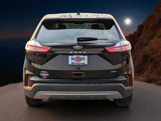Photo of 2024 Agate Black Metallic Ford Edge