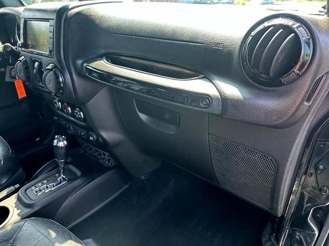 Photo of 2015 Black Clearcoat Jeep Wrangler Unlimited