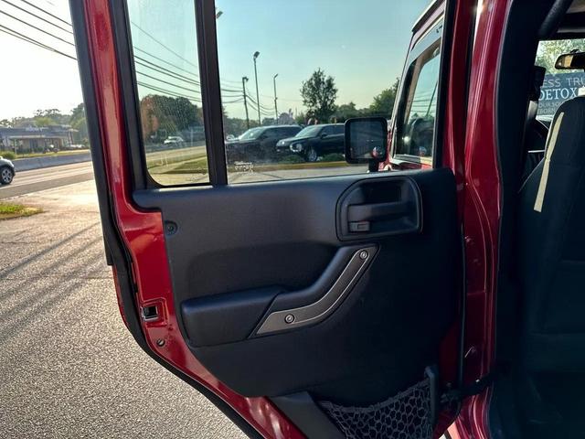 Photo of 2012 Deep Cherry Red Crystal Pearl Jeep Wrangler Unlimited