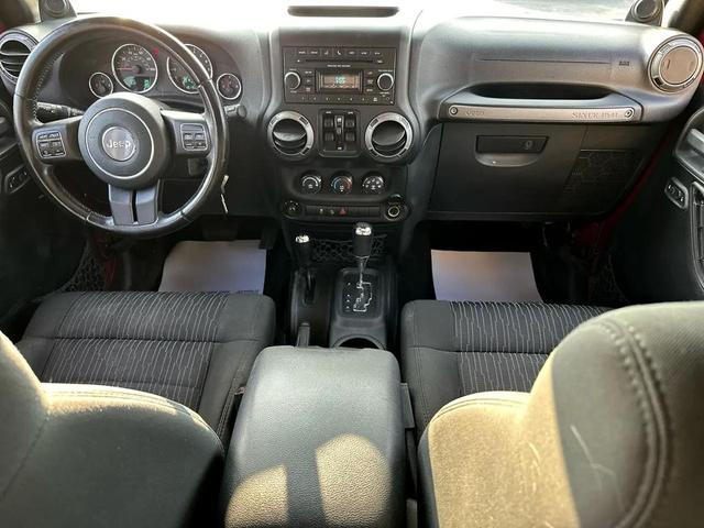 Photo of 2012 Deep Cherry Red Crystal Pearl Jeep Wrangler Unlimited