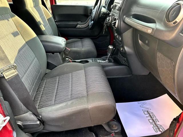 Photo of 2012 Deep Cherry Red Crystal Pearl Jeep Wrangler Unlimited