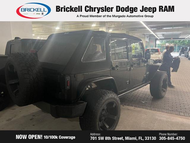 Photo of 2013 Black Clearcoat Jeep Wrangler Unlimited