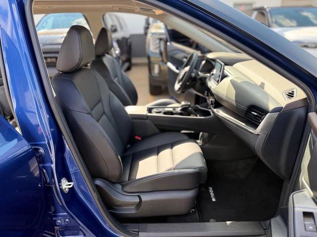 Photo of 2022 Caspian Blue Metallic Nissan Rogue