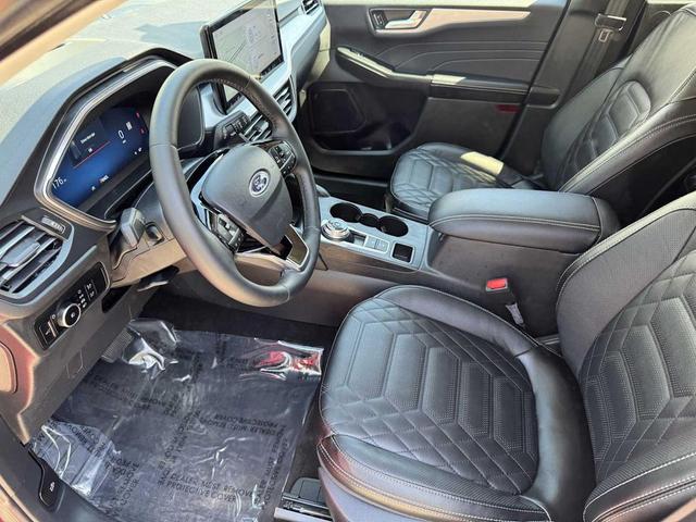 Photo of 2024 Rapid Red Metallic Tinted Clearcoat Ford Escape
