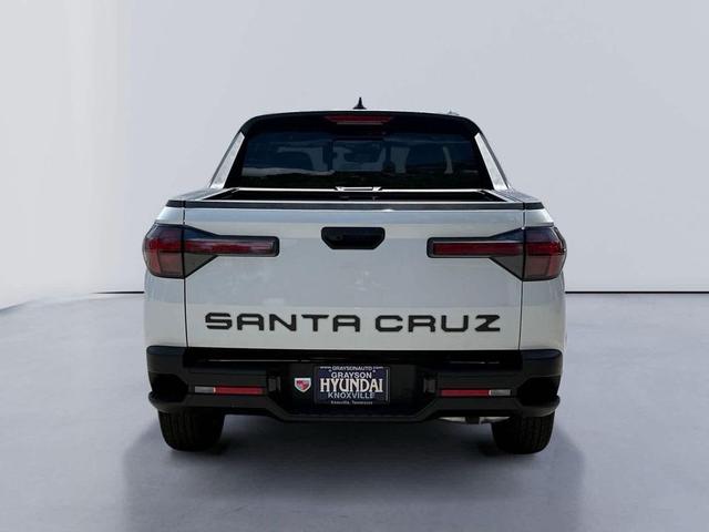 Photo of 2025 Atlas White Hyundai SANTA CRUZ