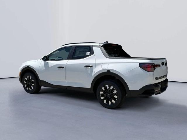 Photo of 2025 Atlas White Hyundai SANTA CRUZ