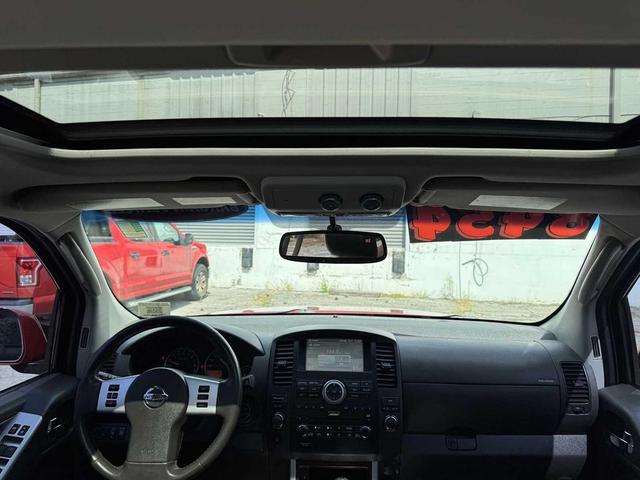 Photo of 2011 Red Brick Nissan Pathfinder