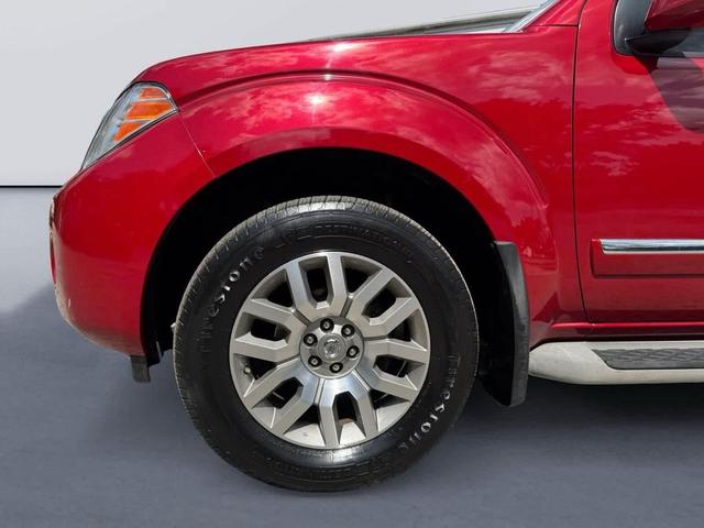 Photo of 2011 Red Brick Nissan Pathfinder