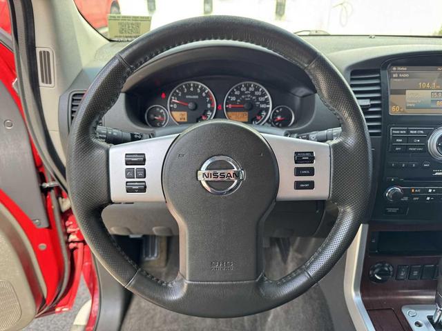 Photo of 2011 Red Brick Nissan Pathfinder
