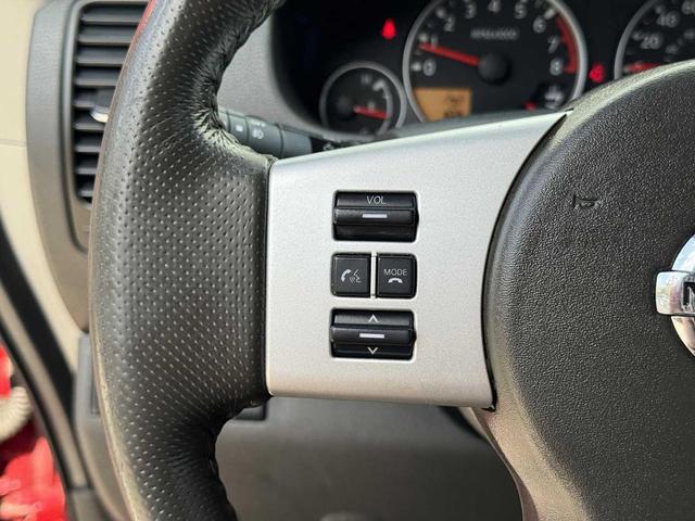 Photo of 2011 Red Brick Nissan Pathfinder