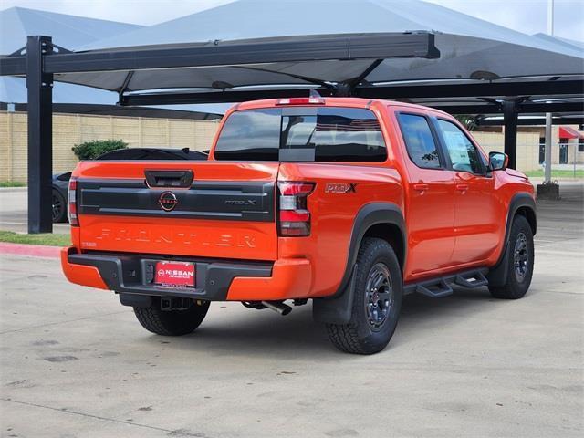 Photo of 2025 Afterburn Orange Nissan Frontier