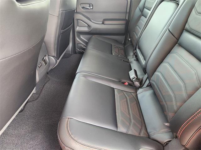 Photo of 2025 Afterburn Orange Nissan Frontier