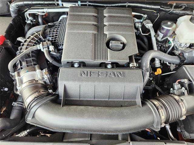 Photo of 2025 Afterburn Orange Nissan Frontier
