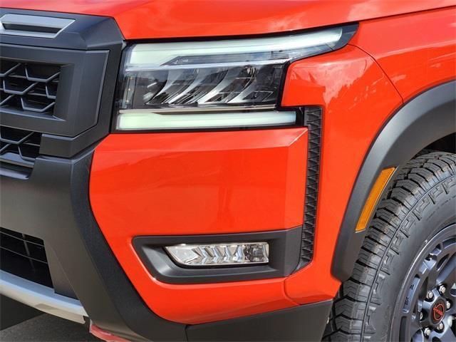 Photo of 2025 Afterburn Orange Nissan Frontier