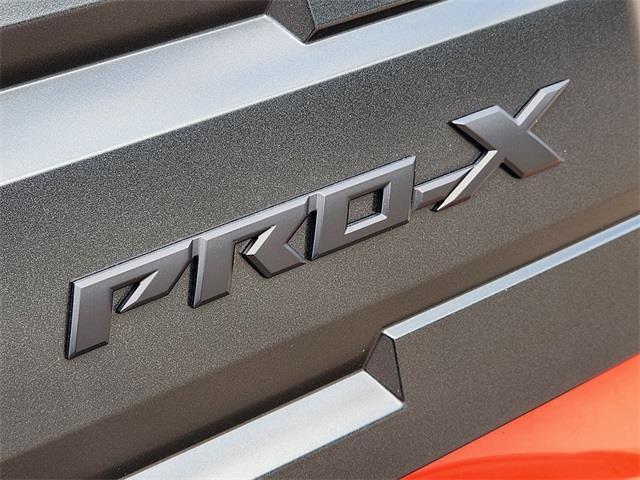 Photo of 2025 Afterburn Orange Nissan Frontier