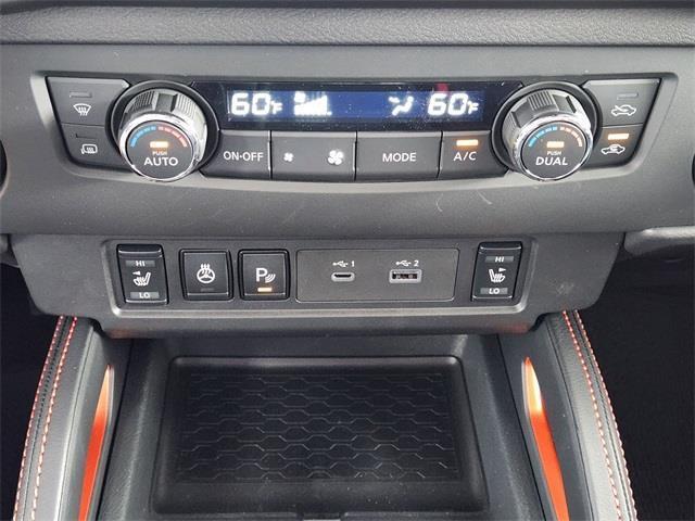 Photo of 2025 Afterburn Orange Nissan Frontier